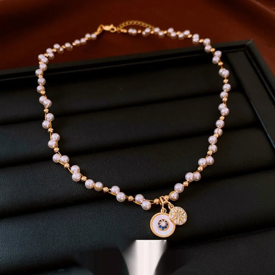 Gold electroplated zircon pearl round pendant necklace with adjustable clavicle chain