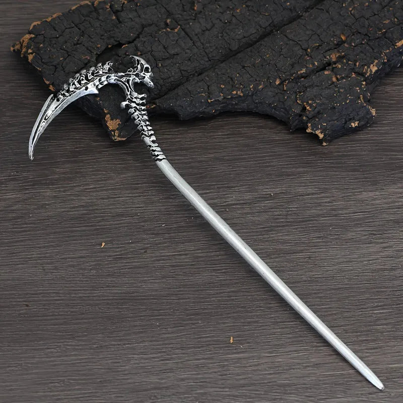 Geometric retro skull sickle hairpin in ancient silver electroplated finish on neutral background