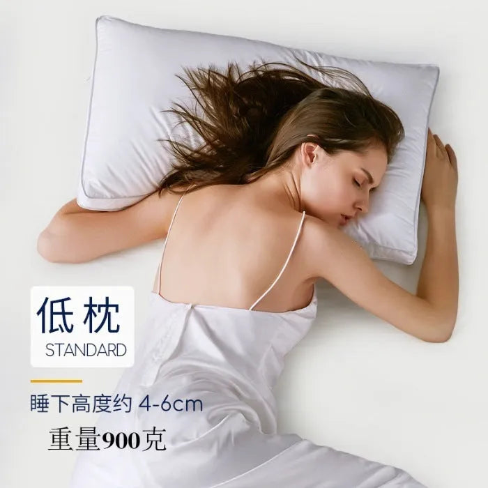 White cotton pillow with a thin satin stripe, showing feather cotton filler and three size options.