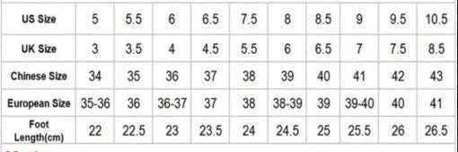 Women's pink satin sandals with heart-shaped rhinestone and cross-belt ankle strap on a pointed toe.