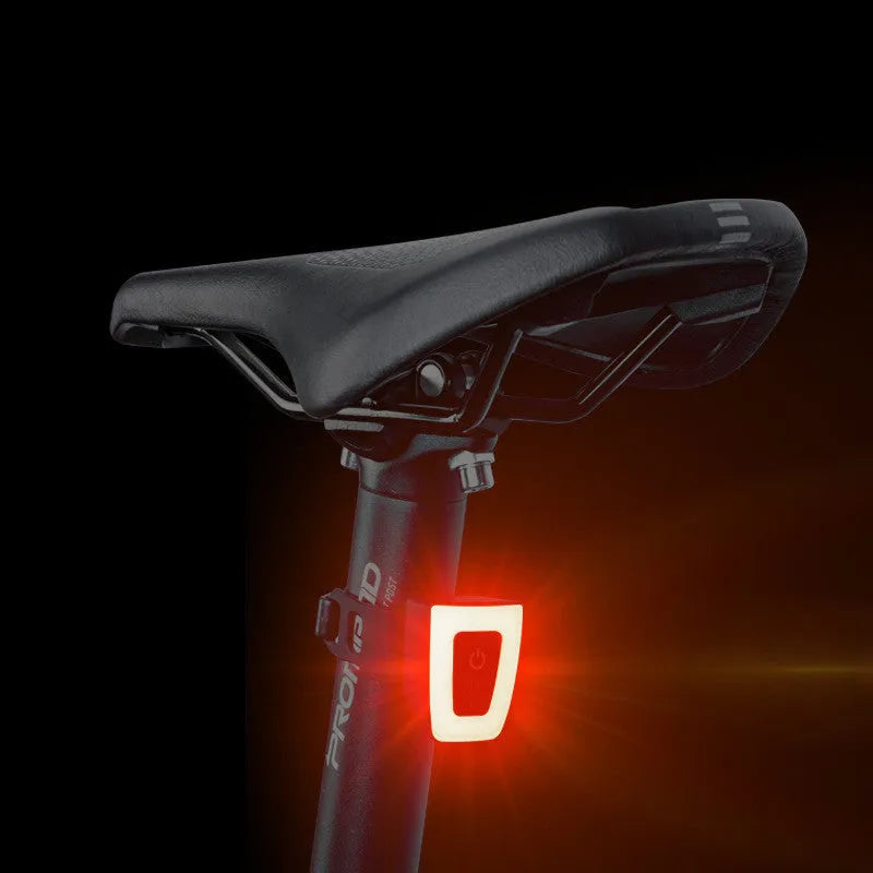 USB rechargeable bicycle taillight with 220mAh battery mounted on a seat tube, white colour