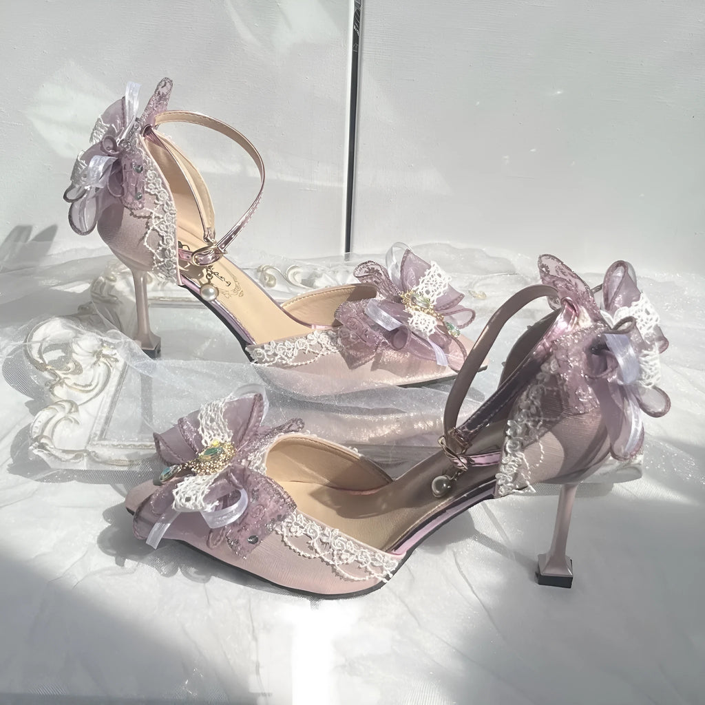 Purple satin Lolita wedding shoes with a square toe and stiletto heel on a composite sole.
