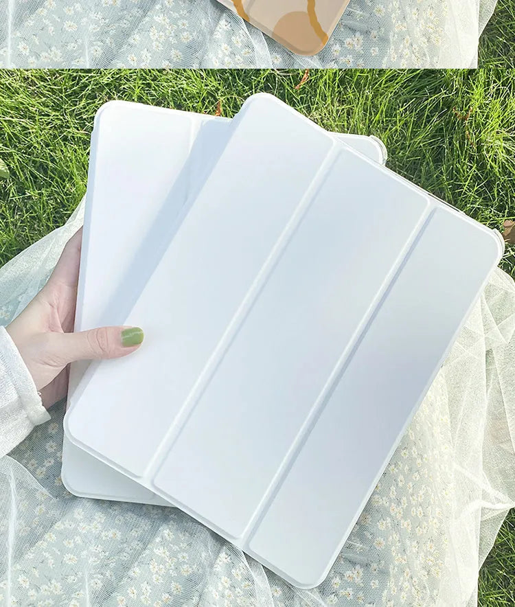 Silicone tri-fold protective case for iPad in cartoon rabbit design, shown folded into a stand position.