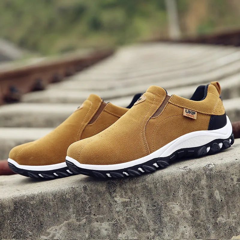 Men's non-slip hiking shoes with artificial PU upper and thick plastic sole on outdoor trail