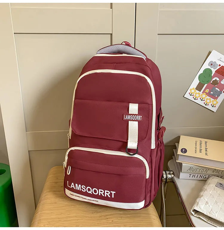 Waterproof nylon high school backpack in multiple colours with under 20L capacity