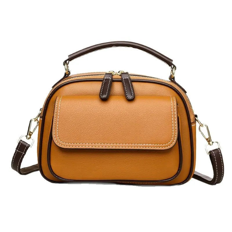 Women's cross-body portable shoulder bag in horizontal square shape with black, green or orange colour options