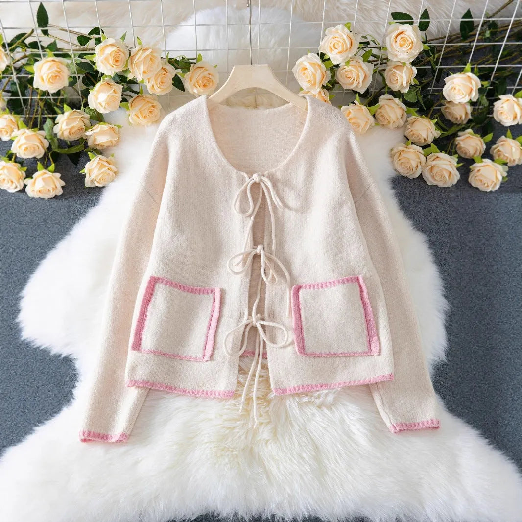 Women's beige loose knitted cardigan with contrast colour, front lace-up fastening and pocket, sizes S to XL