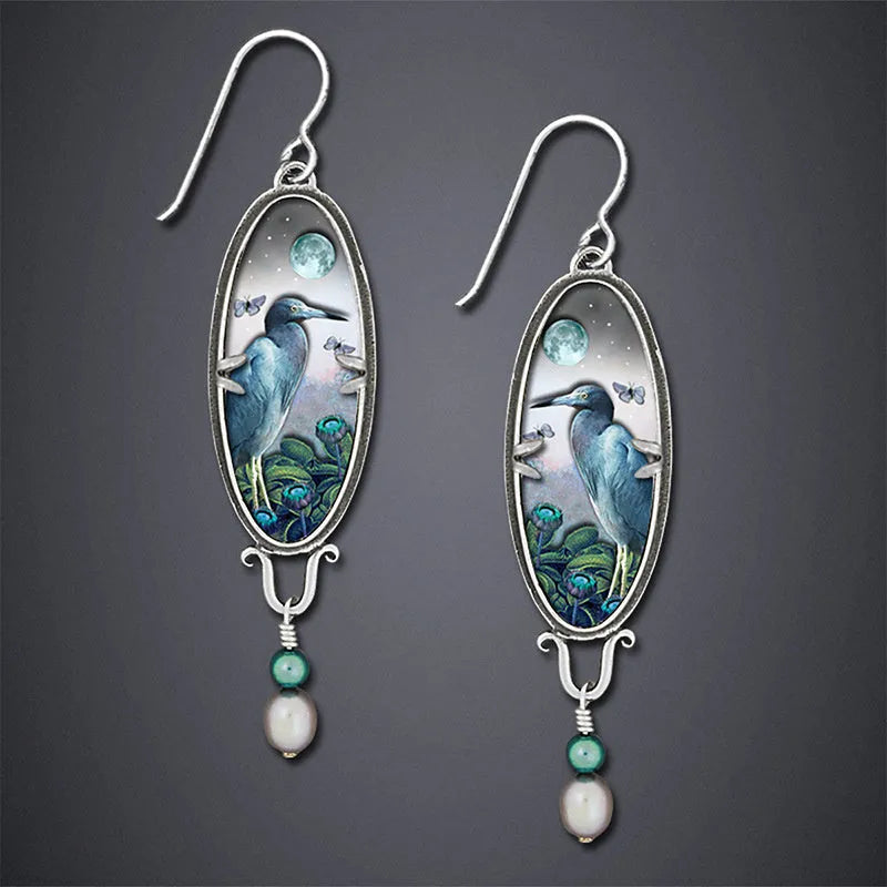 Silver retro bird and flower design drop earrings made of metal