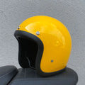 Cement Grey retro open-face motorcycle helmet with clear visor on a plain background.