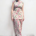 Women's long sleeve printed chiffon two-piece dress set with high waist skirt.