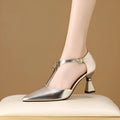 Women's gold genuine leather hollowed sandals with a pointed toe on a white background.