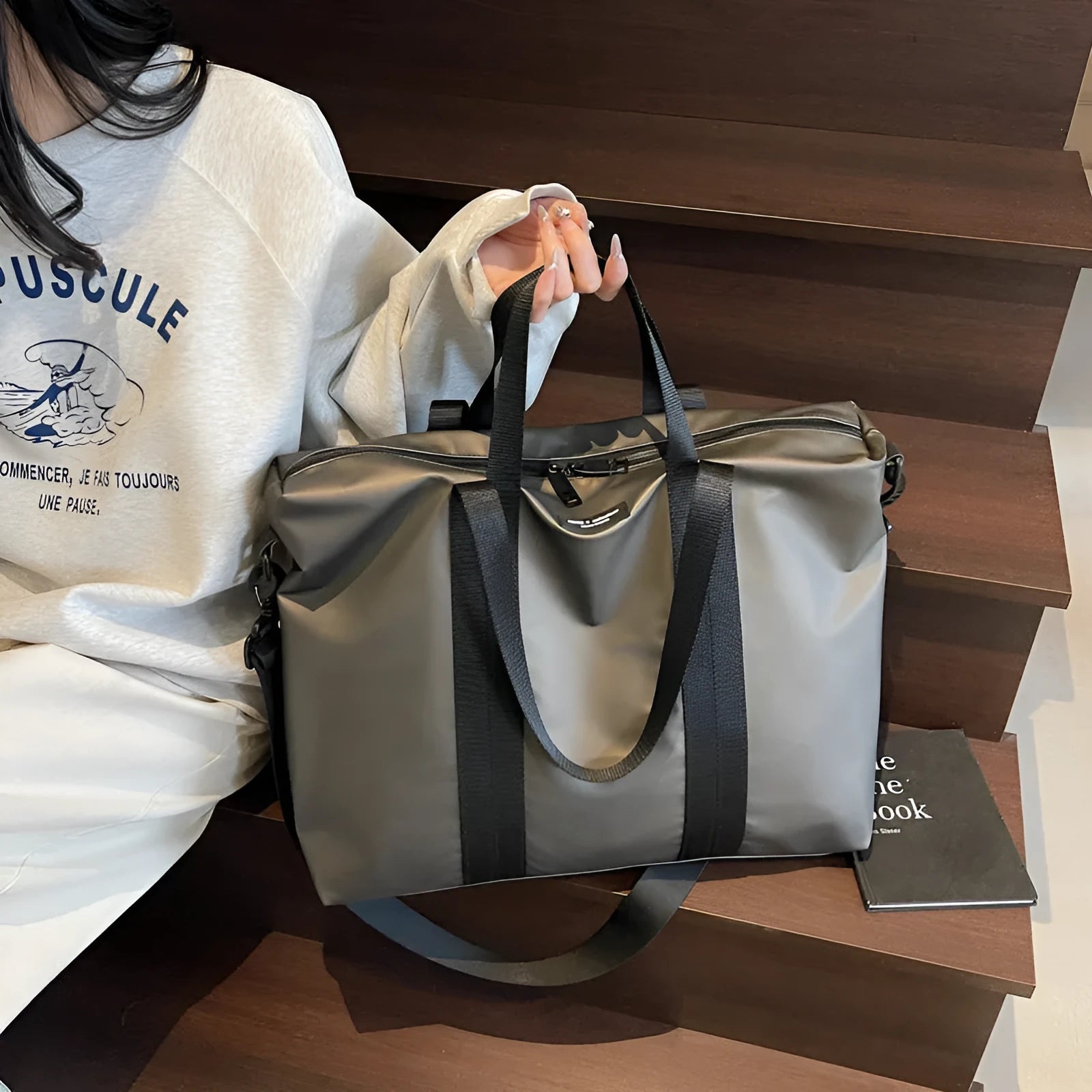 Lightweight Oxford cloth tote bag in black, grey or champagne with 20-35 litre capacity for business travel
