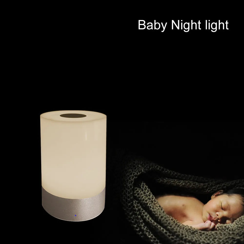 Creative home bedside night light LED lamp with dimmable white and colour light on a desk