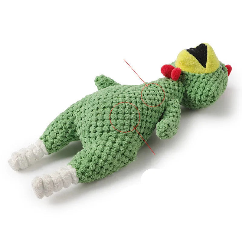 Soft pineapple fleece squeaker dog toy in yellow, green, and pink on a plain background
