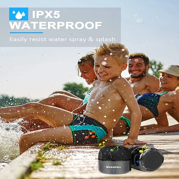 Black plastic waterproof portable mini Bluetooth speaker with buttons.