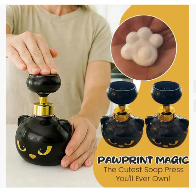 Black cartoon cat-shaped plastic foam soap dispenser pump, 10cm wide by 18cm tall.