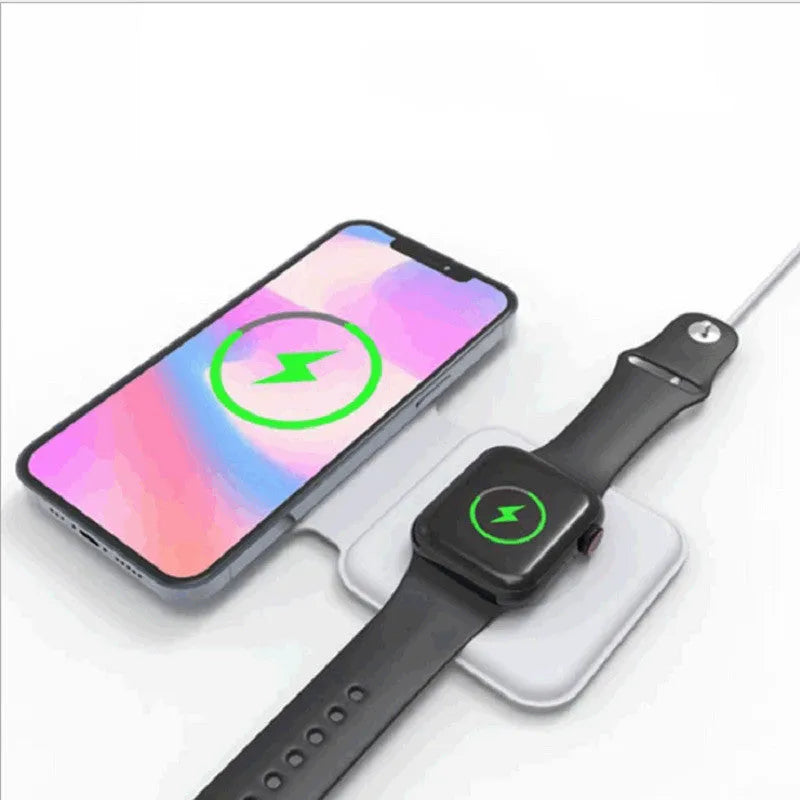 White folding magnetic wireless charger in stand mode, charging a smartphone at an angle