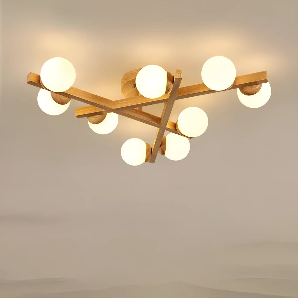 Modern Nordic-style wooden ceiling light fixture with three adjustable lamp heads mounted on a living room ceiling.