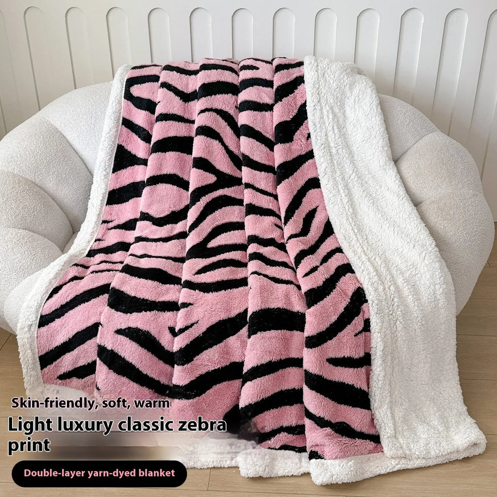 Double-layer cationic jacquard taffeta blanket with leopard print pattern in camel colour.