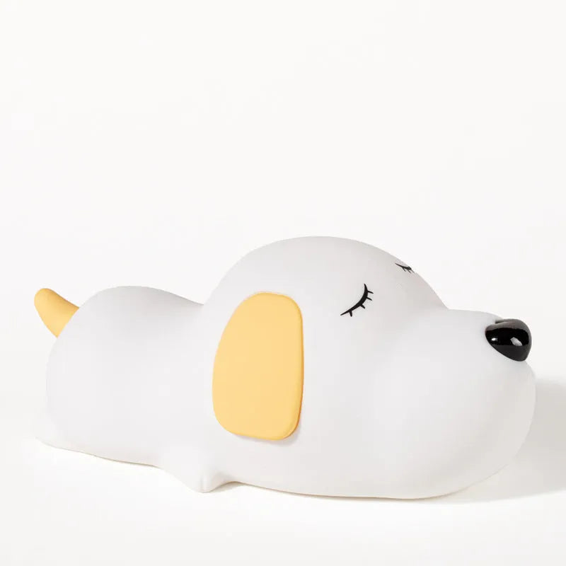 Silicone cartoon dog night light with two colours and a USB cable.
