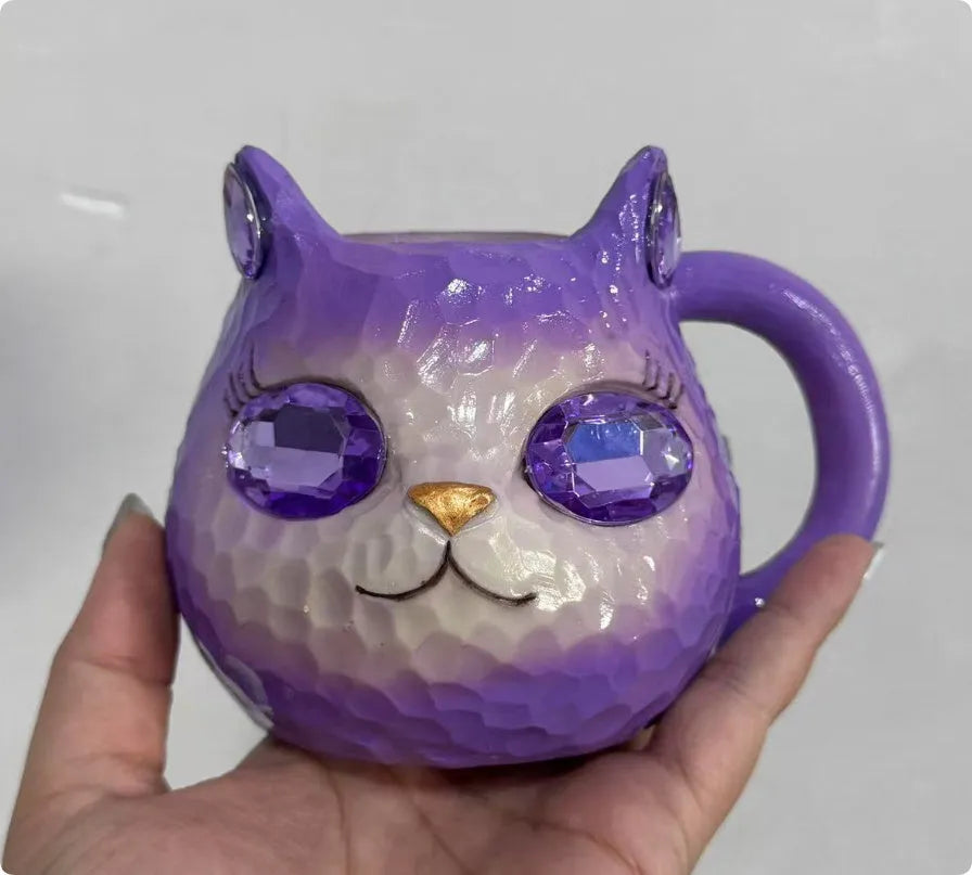 American-style cat cup resin craft ornament in purple, green, blue, and pink colours.