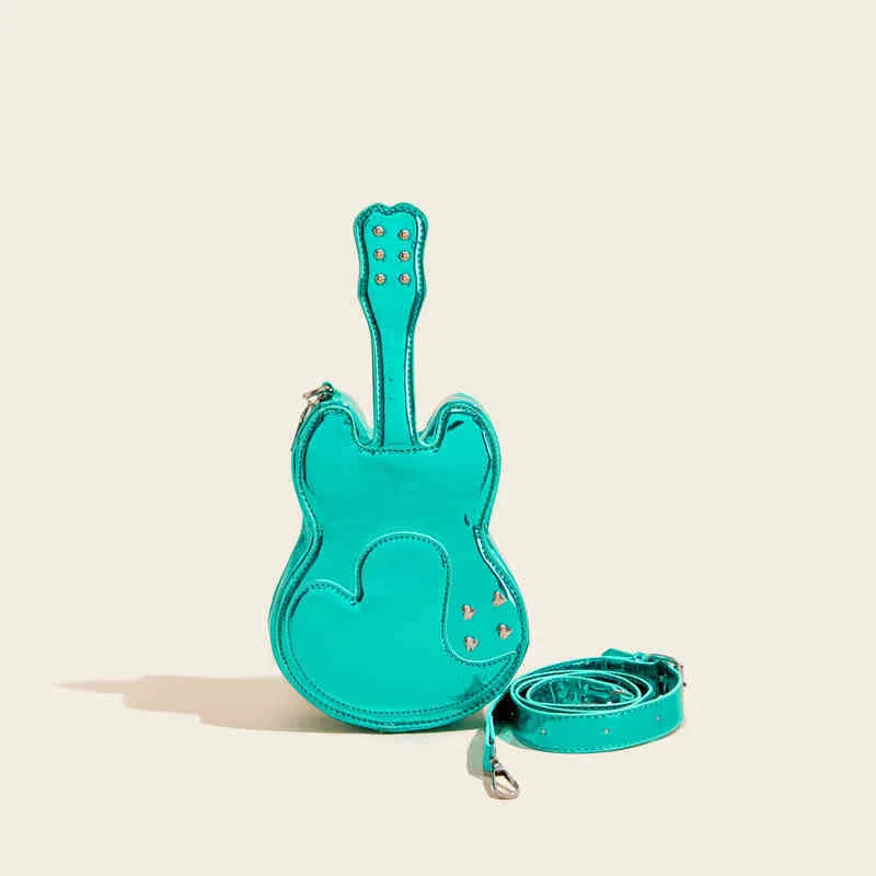 Guitar-shaped silver crossbody shoulder bag with a black strap.