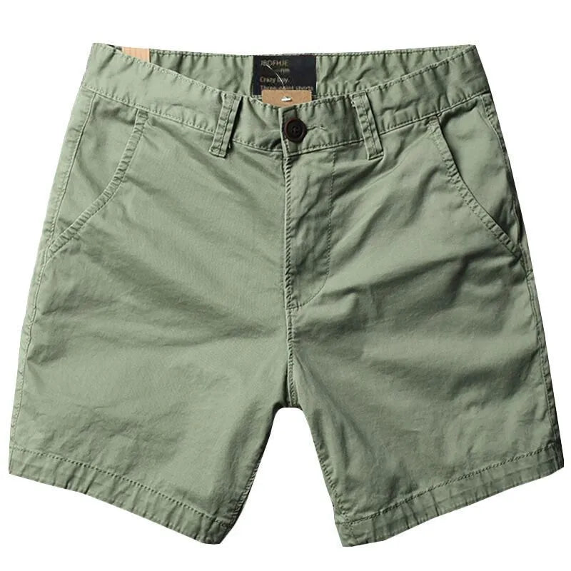 Men's loose cotton shorts in straight-leg style showing zipper fly and multiple colour options