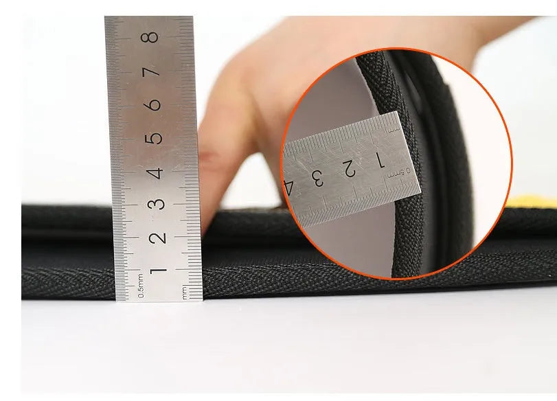 Nylon fitness weightlifting waistband in black, red, or yellow colours on a plain background.