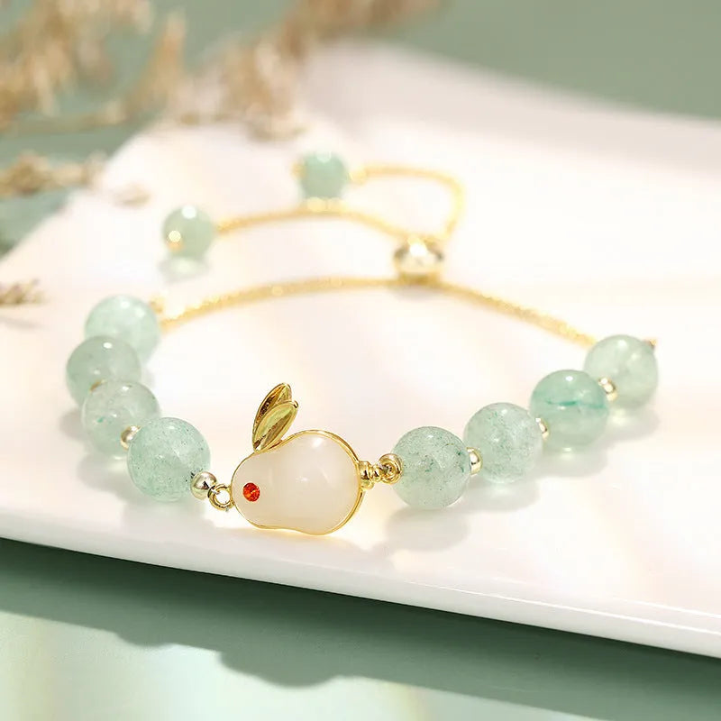 Adjustable rabbit charm bracelet with green aventurine or strawberry quartz stone beads and gold accents