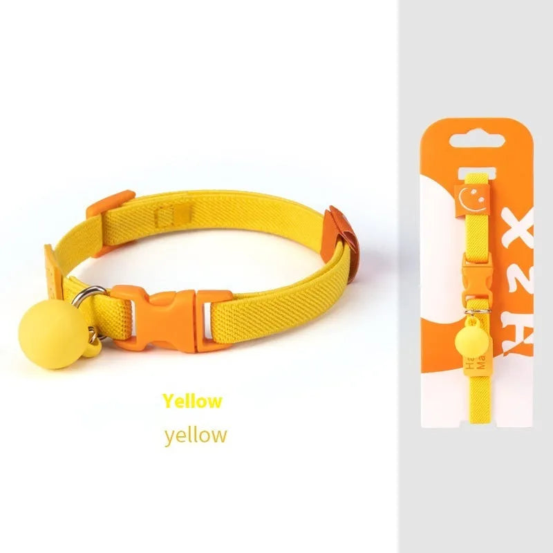 A small, high-elasticity polyester dog collar in a monochrome colour, showing the plastic buckle and adjustable strap.