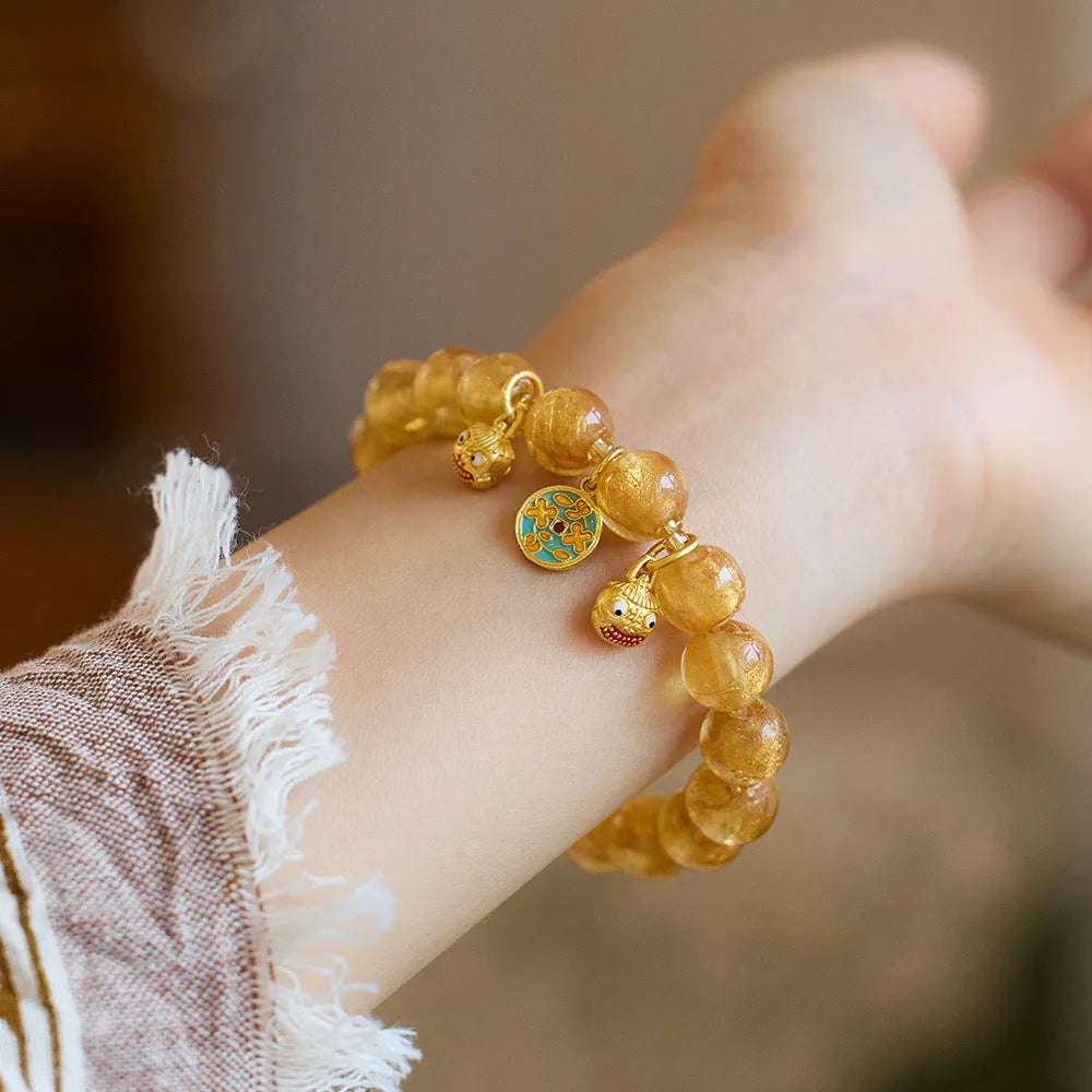 Handmade national style bracelet with fragrant grey gold foil coloured glaze swallowing gold beast geometric design
