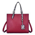 Women's solid colour diagonal cross body stone tote bag in black, 25x29x10cm, PU fabric with crocodile pattern
