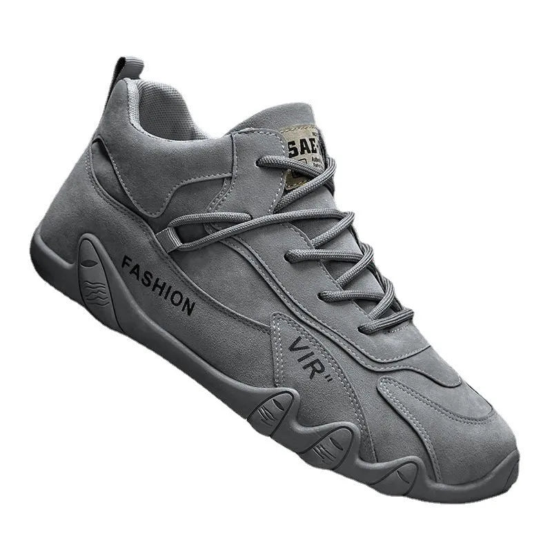 Men's grey low-cut casual work shoes with elastic band and non-slip sole on a plain background.