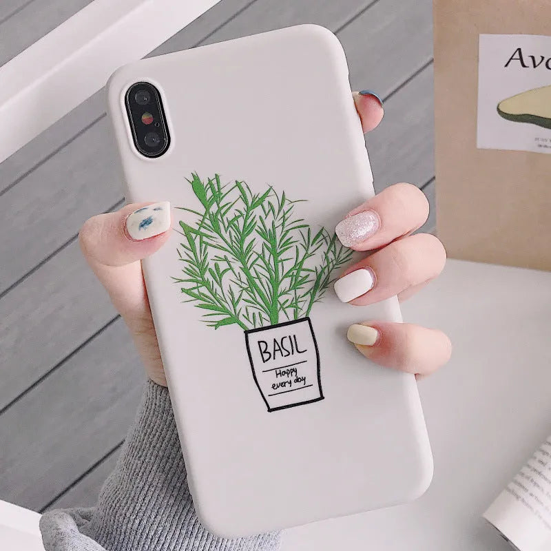 White silicone iPhone case with detailed painted plant design on the back