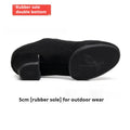 Men's black oxford cloth ballroom dancing shoes with rubber sole and middle heel on a dance floor