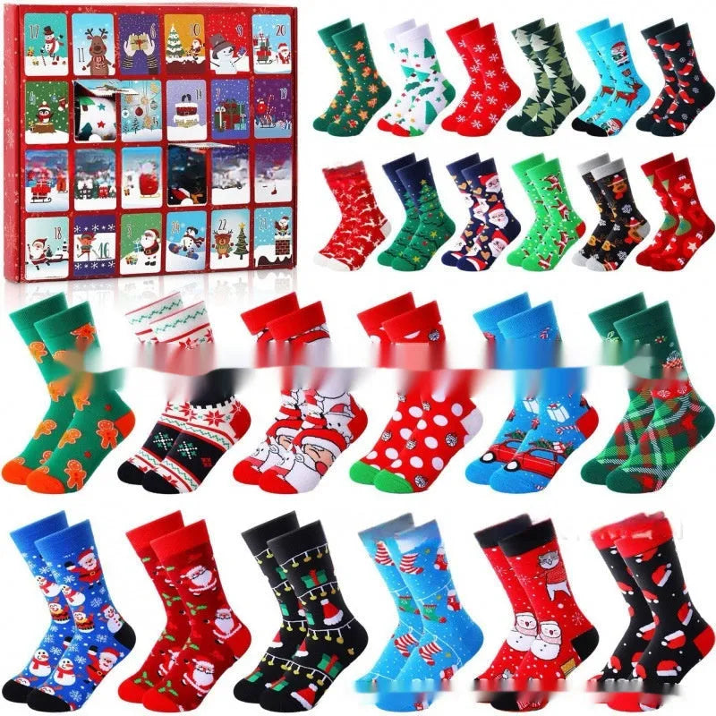 Set of seven colourful miniature Christmas sock ornaments from a blind box collection.