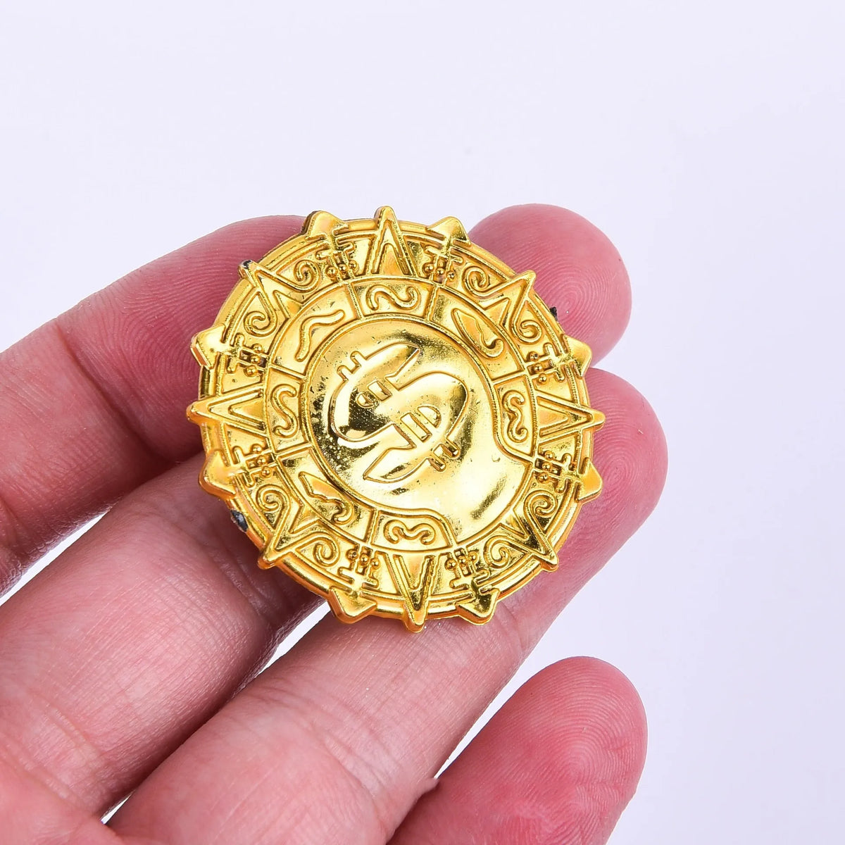 Plastic pirate gold coin toy with pointed star design for Halloween costumes