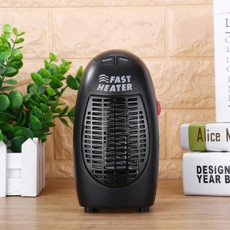 Black portable ceramic electric heater with digital display and rotating plug on a white background.