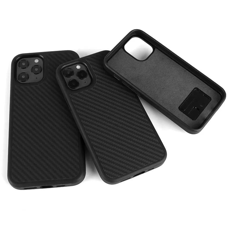 Black wooden back cover case for iPhone on a table.