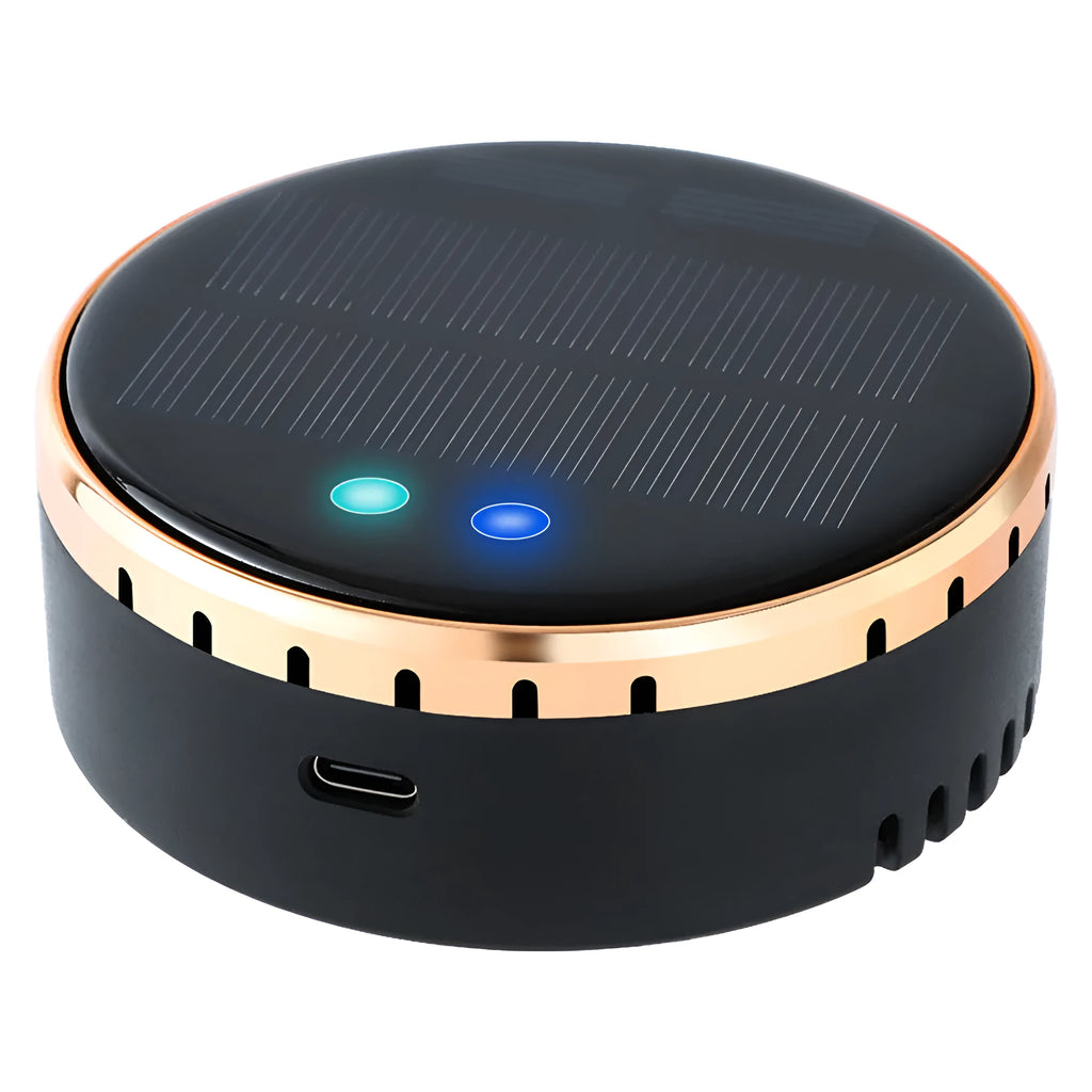 Compact black solar-powered car air humidifier installed in a vehicle air vent.