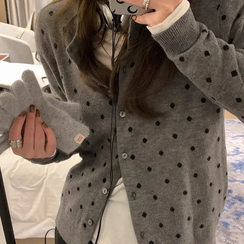 Grey dot crochet pattern on a loose-fit black women's viscose knitted cardigan.