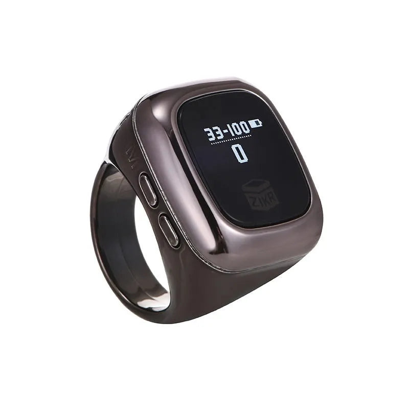 Al-Fatiha Zikr digital wrist counter on strap, showing display screen, available in multiple colours and sizes.