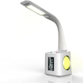 White 7-in-1 LED desk lamp with USB port, LCD screen, calendar, pen holder and colour night light base