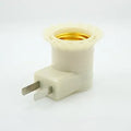 White UK wall plug-in E27 screw lamp holder with a built-in on/off switch.