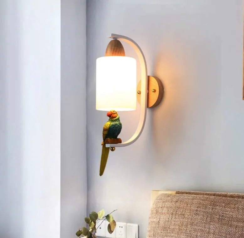 Solid wood and iron wall lamp with glass shade on a wall in a stairway