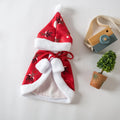 Red deer-print Christmas cloak cape on a cat, showing Little Red Riding Hood style.