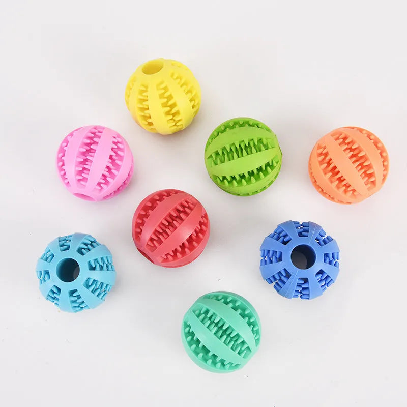 Small pink rubber dog chew toy with a 5 cm diameter for molar cleaning and self-entertainment