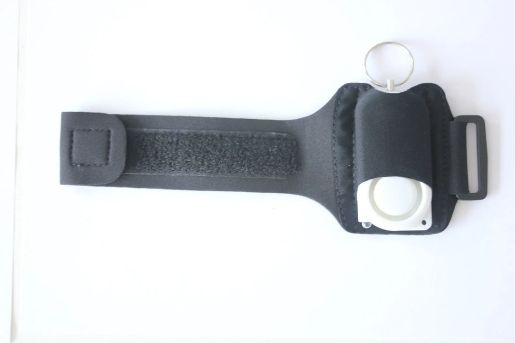 Runner Personal Alarm with LED flashing light and adjustable black wristband on white background