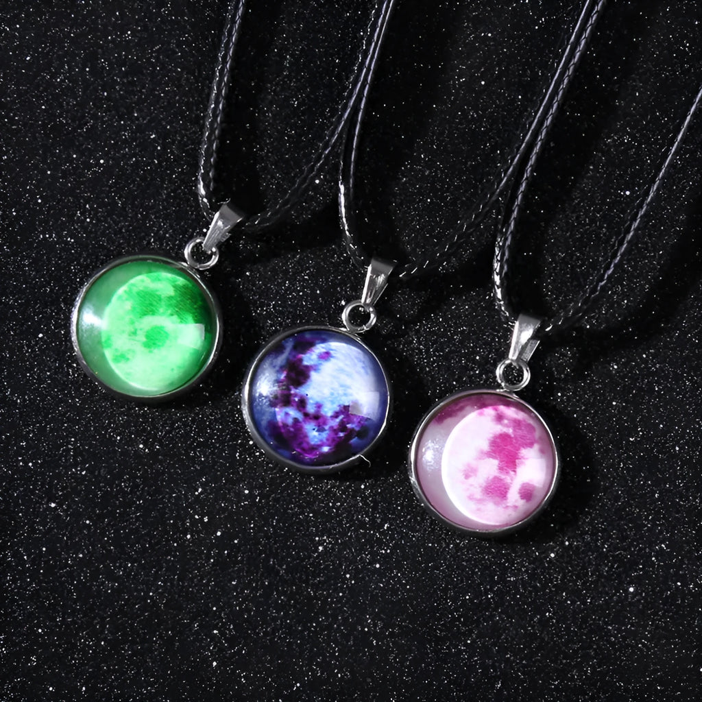 Luminous Christmas moon and starry night sky pendant necklace on a chain with extension.