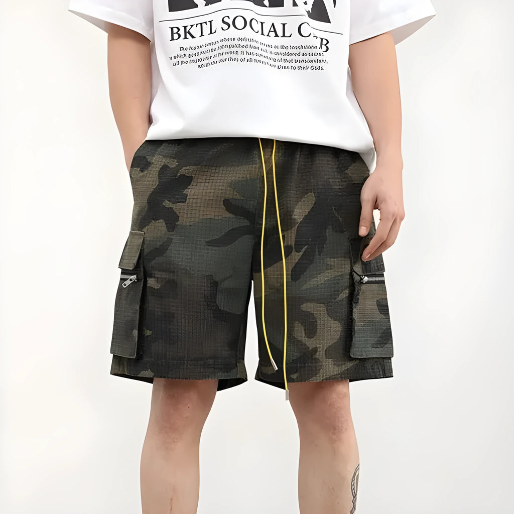 Men's camouflage pattern multi-pocket work shorts in a cropped length.